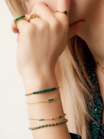 Armband met groene bedel - goud