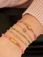 Armband met roze steentje - goud