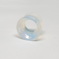 Double-flared tunnel opalite